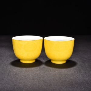 Qing Dynasty Yongzheng lemon yellow glaze rolled flower cup