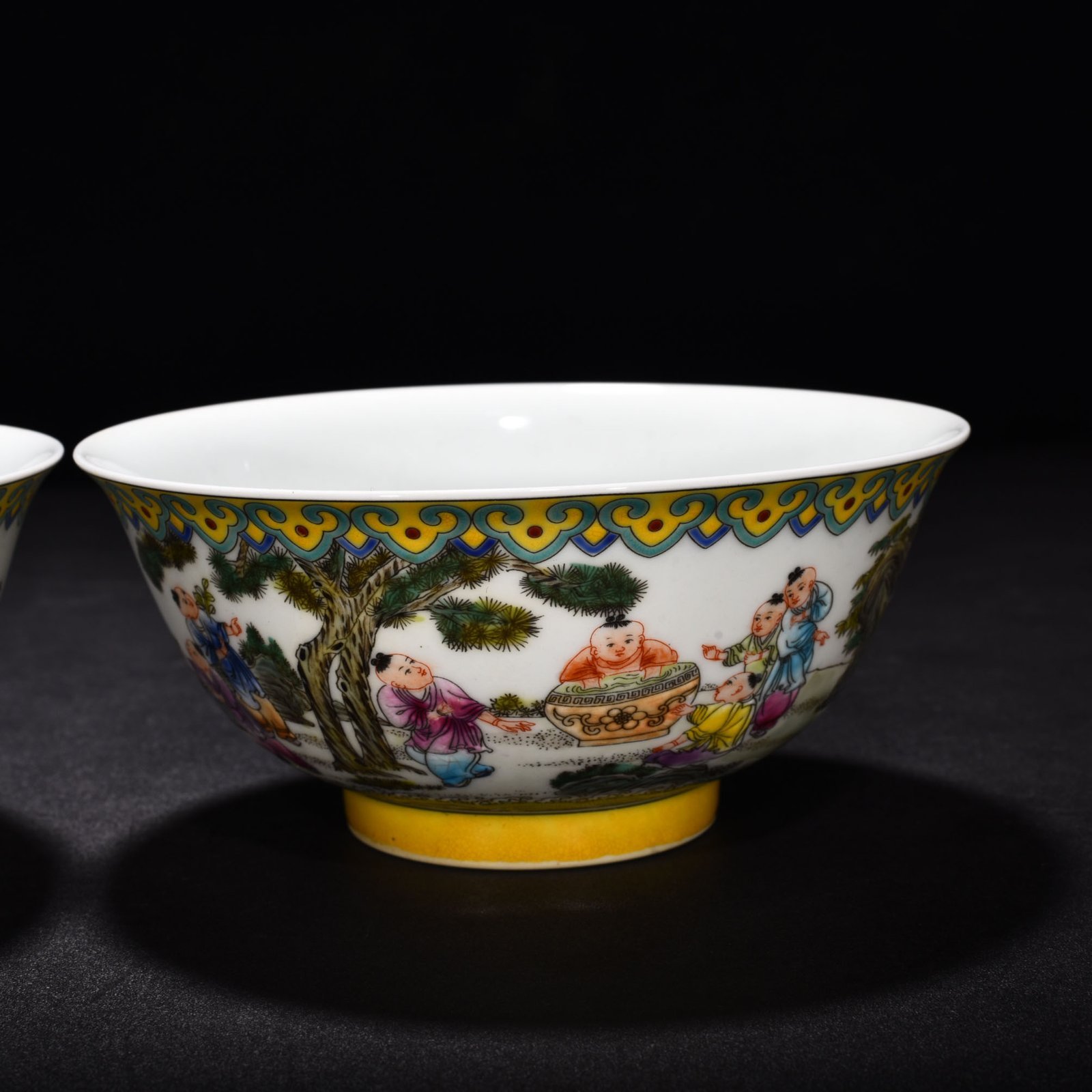 Qing Dynasty Yongzheng enamel palace-style bowl with baby playing