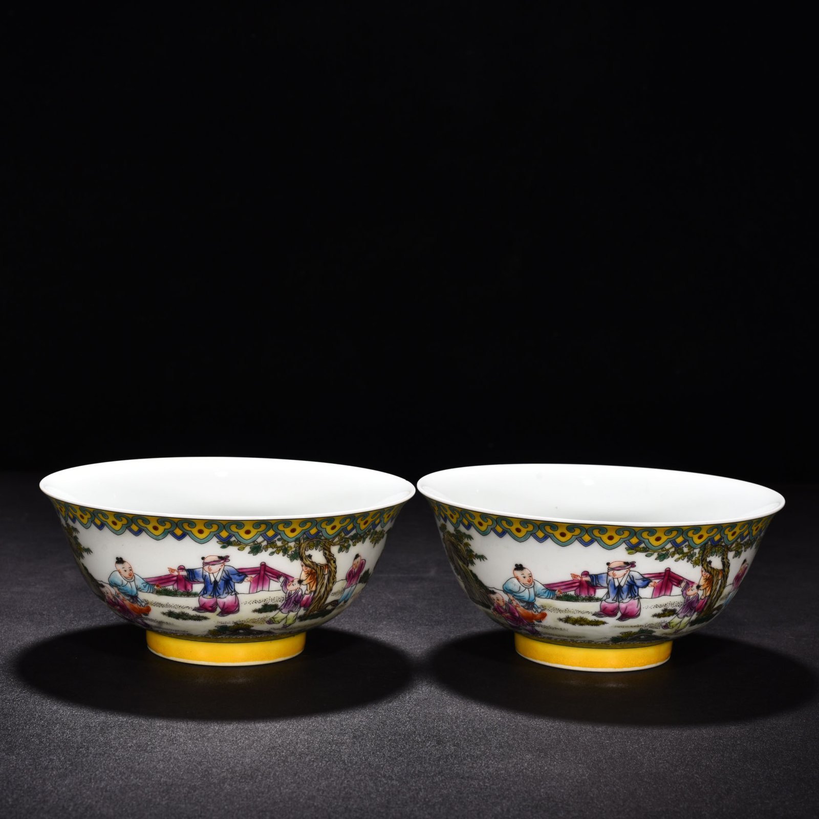 Qing Dynasty Yongzheng enamel palace-style bowl with baby playing