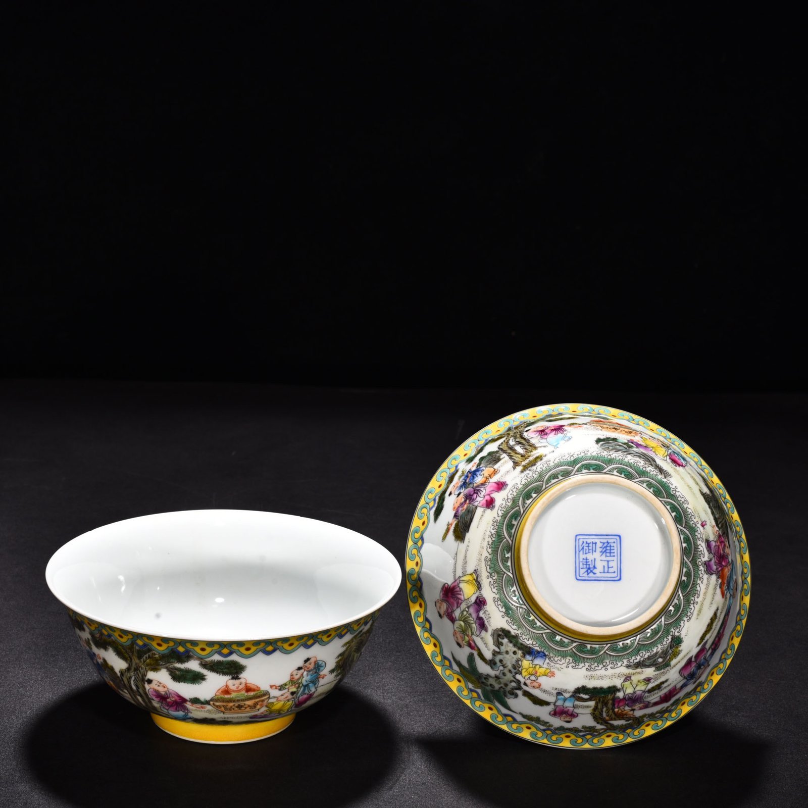 Qing Dynasty Yongzheng enamel palace-style bowl with baby playing