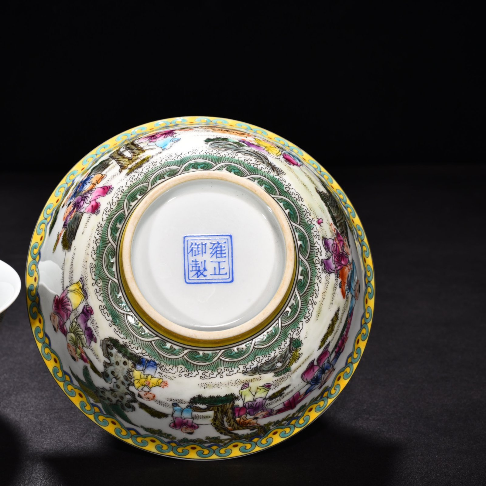 Qing Dynasty Yongzheng enamel palace-style bowl with baby playing