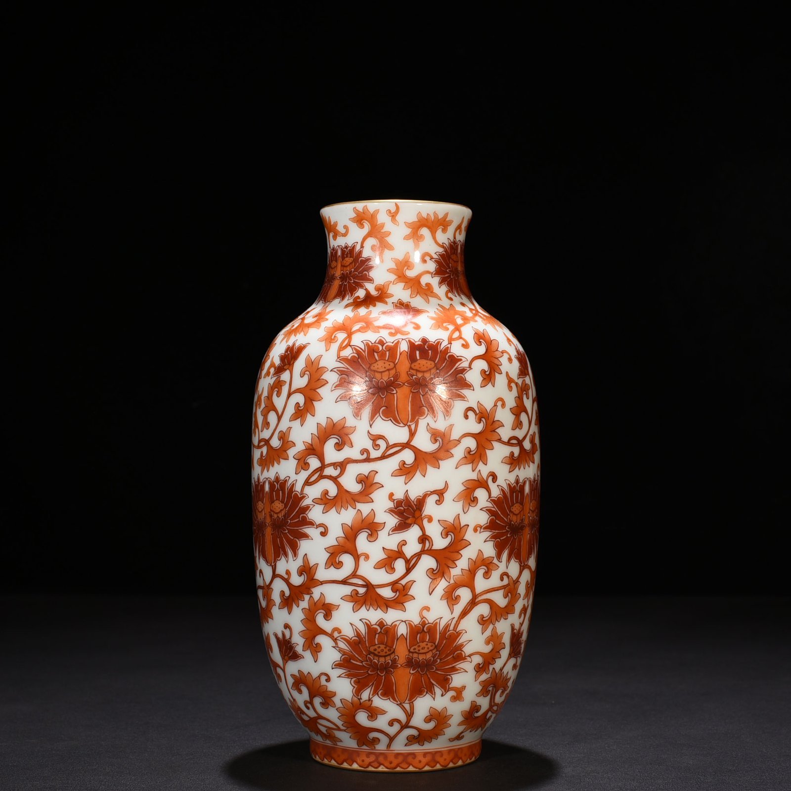 Qing Dynasty Yongzheng alum red lantern vase with entwined branches and lotus