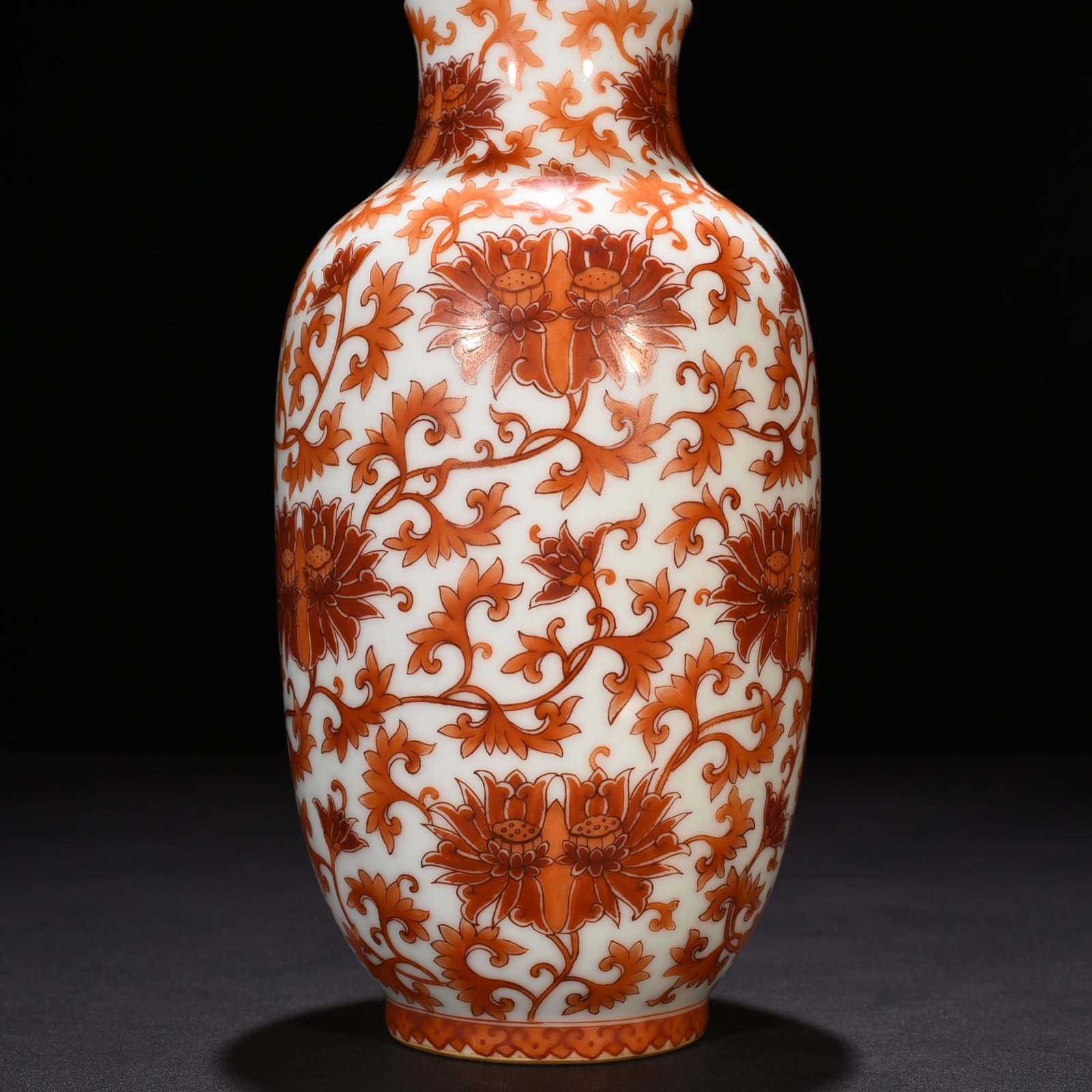 Qing Dynasty Yongzheng alum red lantern vase with entwined branches and lotus