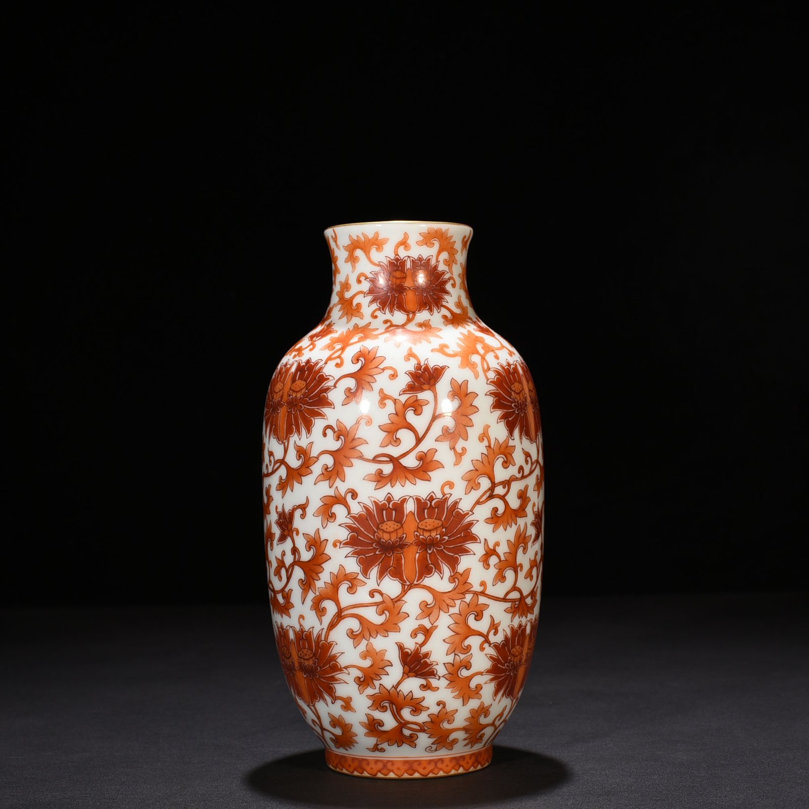 Qing Dynasty Yongzheng alum red lantern vase with entwined branches and lotus
