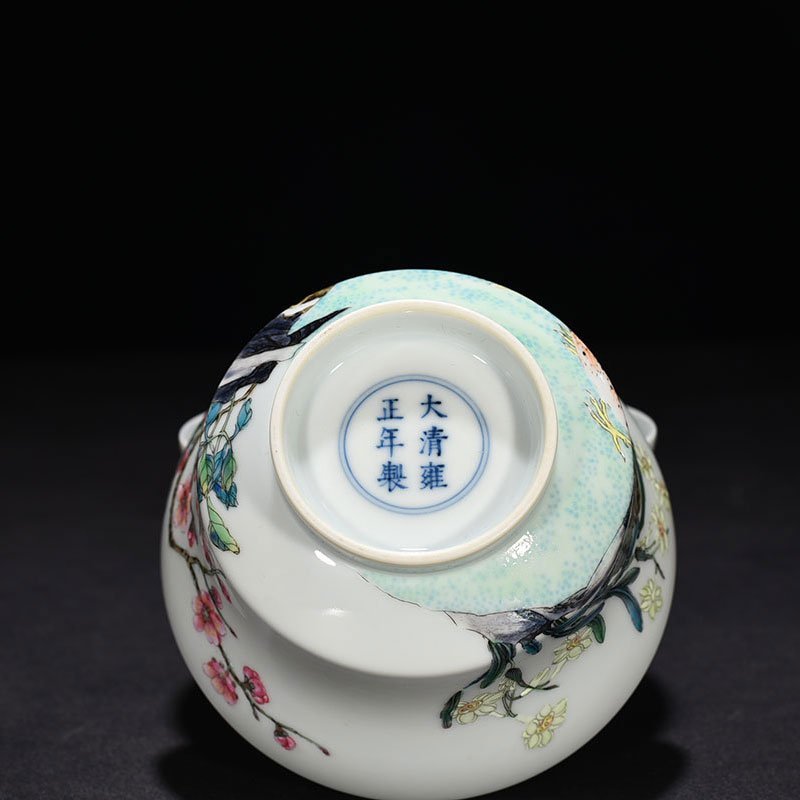 Qing Dynasty Yongzheng famille rose flower and bird bowl