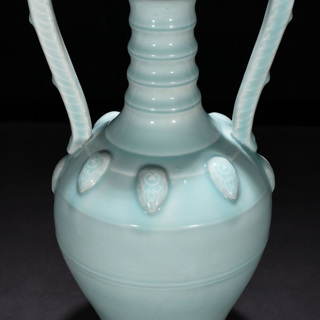 Qing Dynasty Yongzheng pink celadon glaze double dragon statue