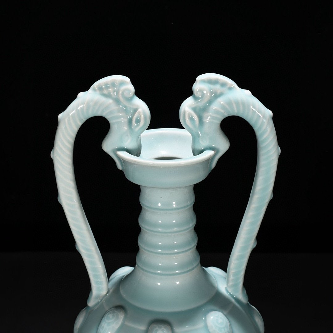 Qing Dynasty Yongzheng pink celadon glaze double dragon statue