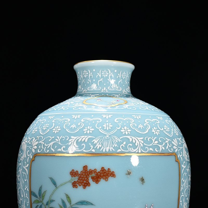Qing Dynasty Yongzheng pink celadon glaze consecrated pink flower plum vase