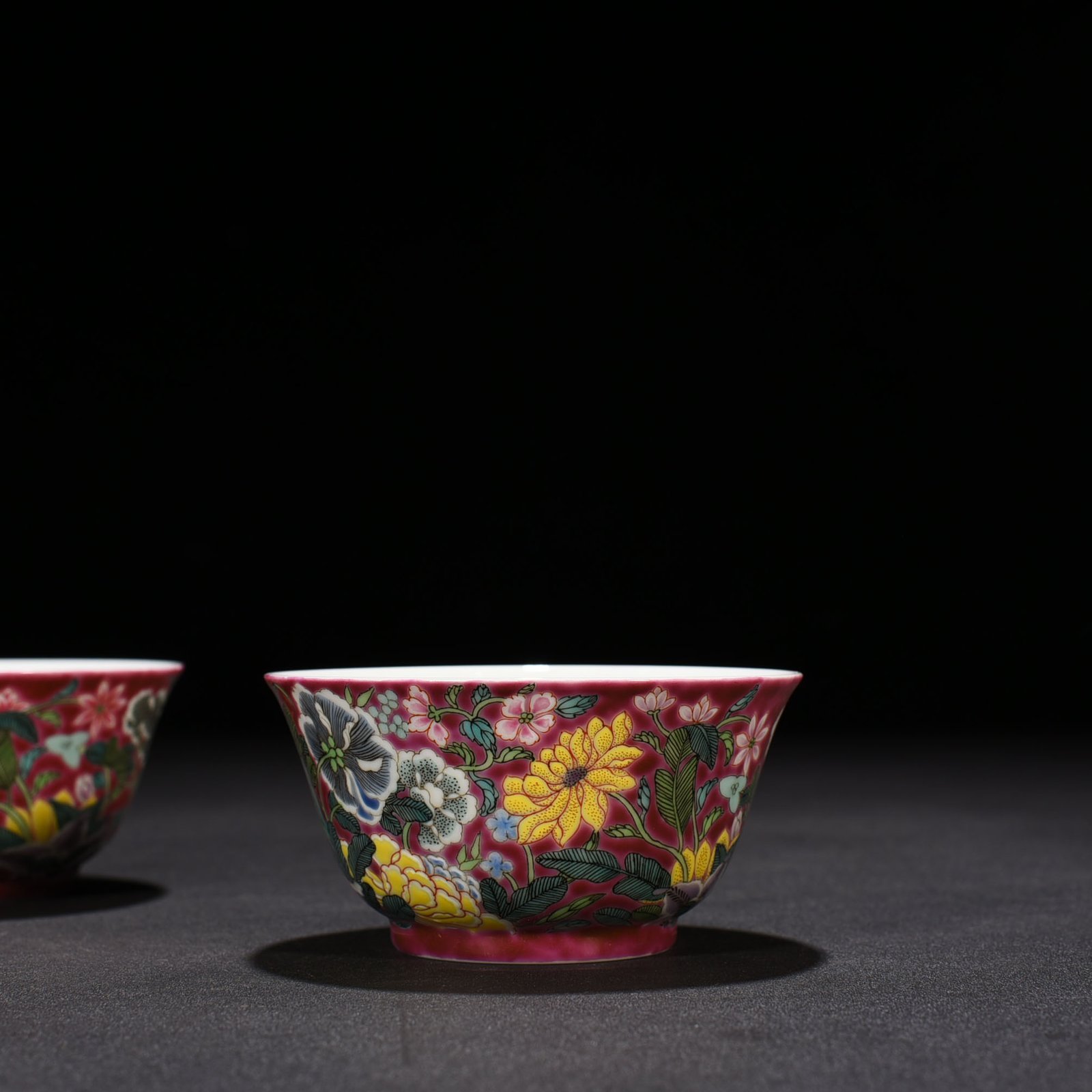 Qing Dynasty Yongzheng rouge ground pastel nine-autumn cup