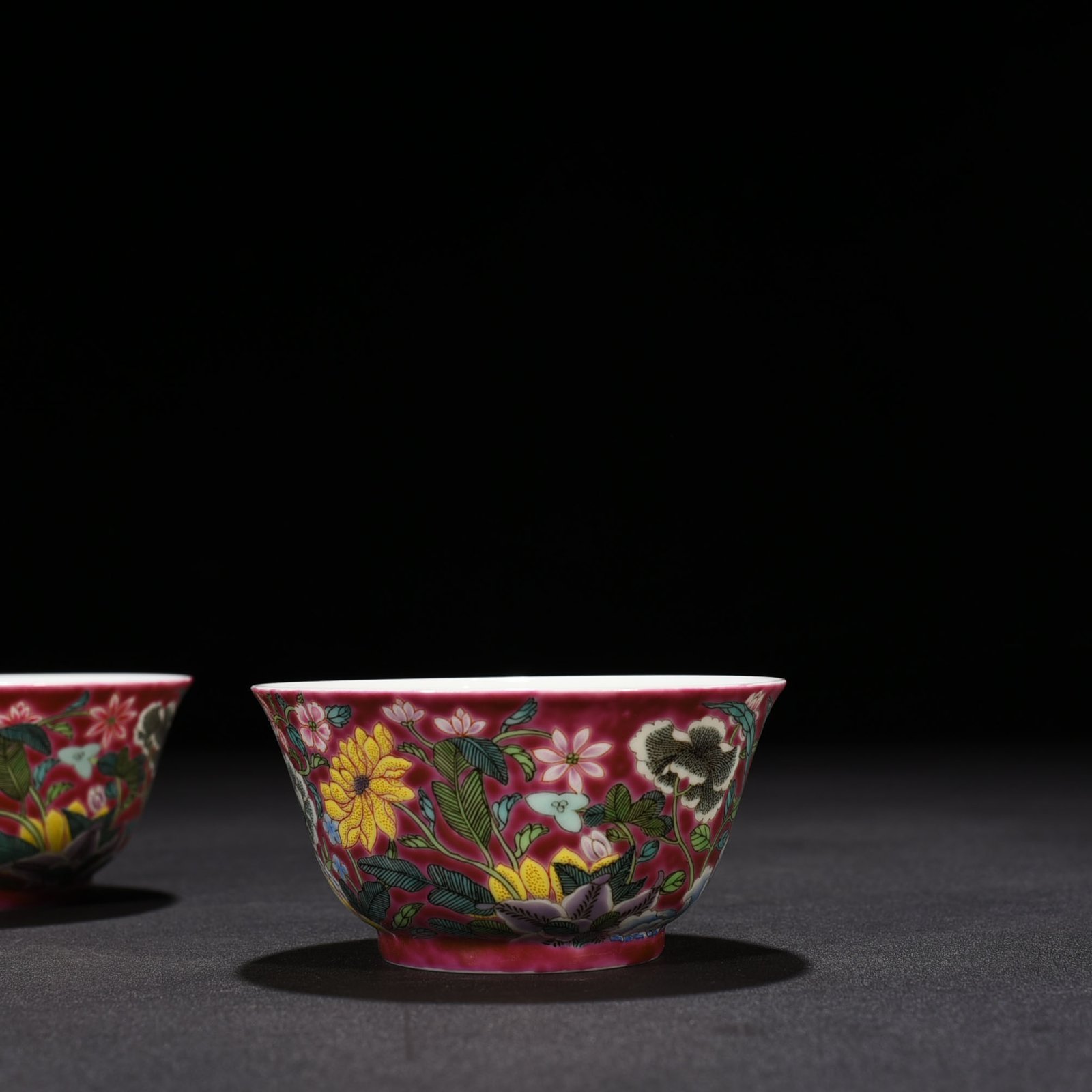 Qing Dynasty Yongzheng rouge ground pastel nine-autumn cup