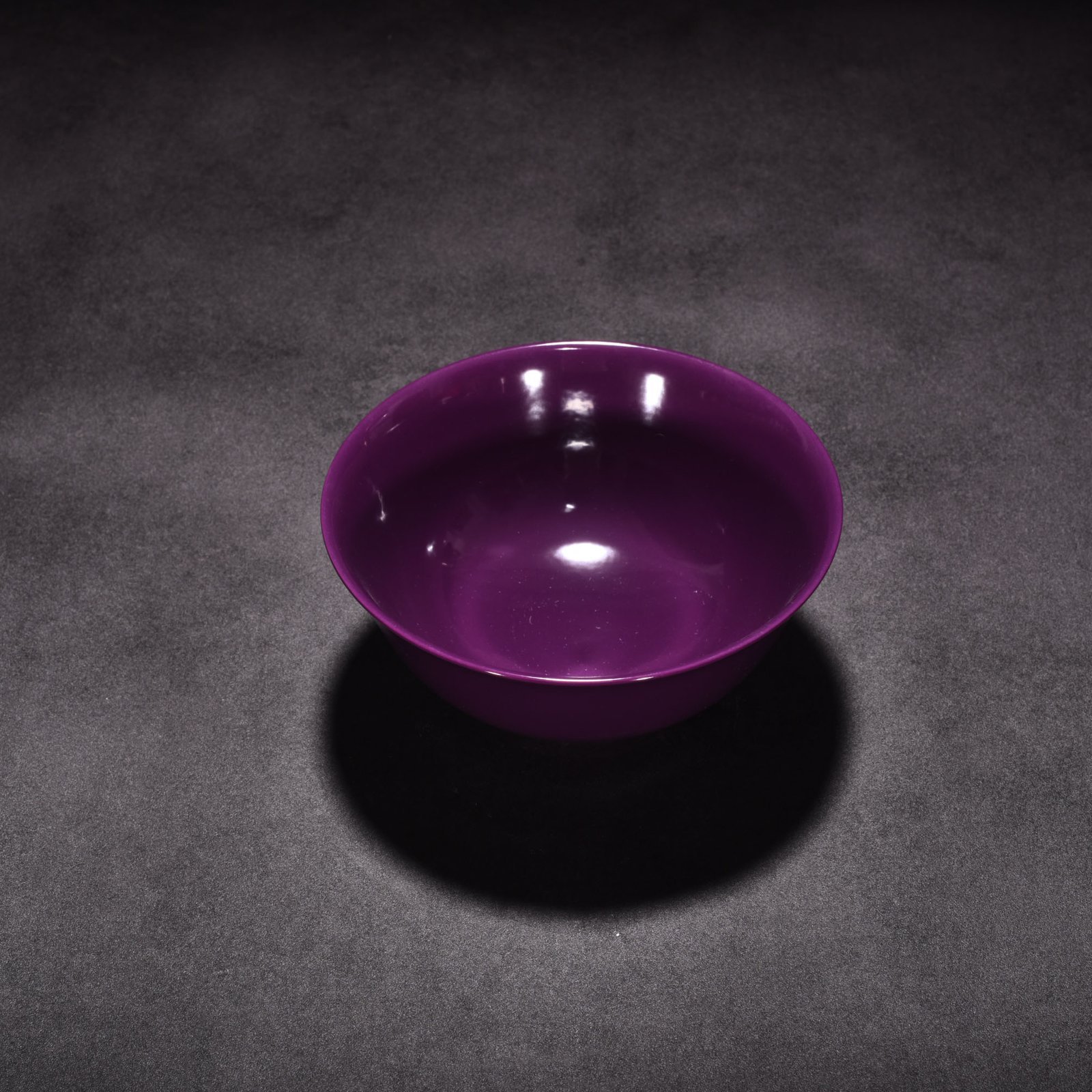 Qing Dynasty Yongzheng eggplant skin purple glaze palace bowl
