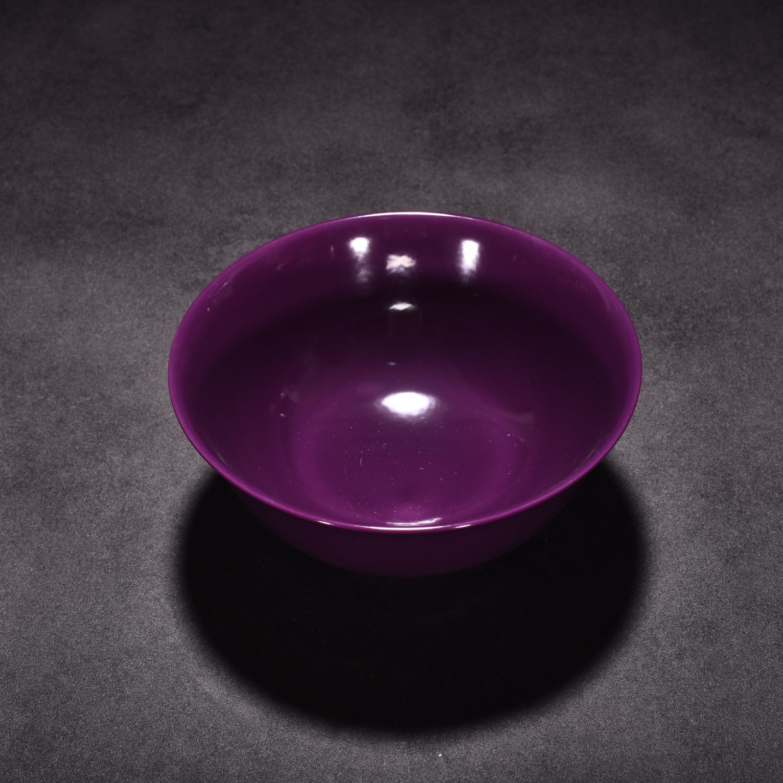 Qing Dynasty Yongzheng eggplant skin purple glaze palace bowl