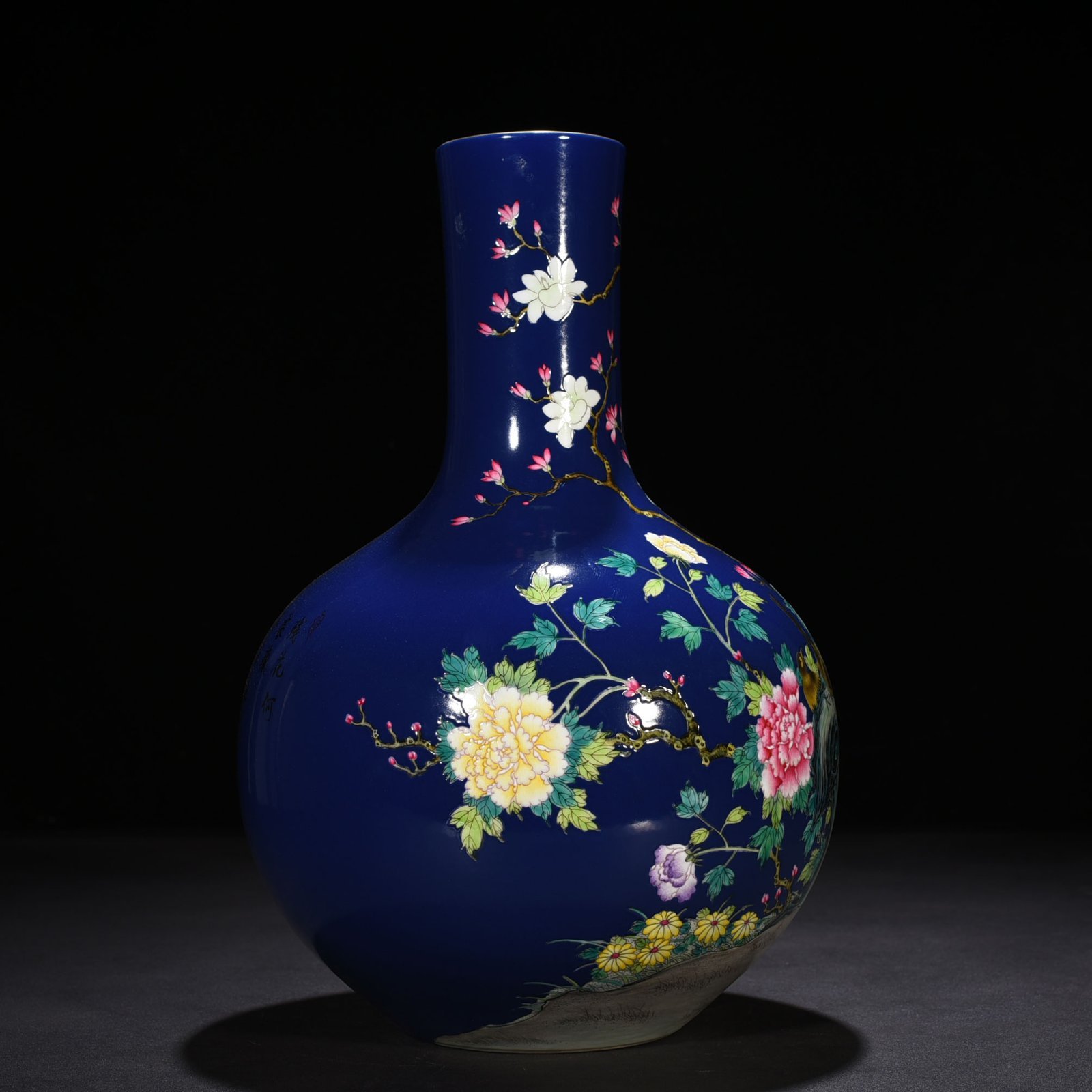 Qing Dynasty Yongzheng blue ground pastel peony flower and bird pattern celestial vase