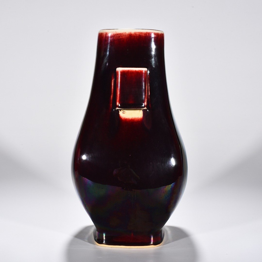 Qing Dynasty Yongzheng Lang Kiln red glaze through-ear vase