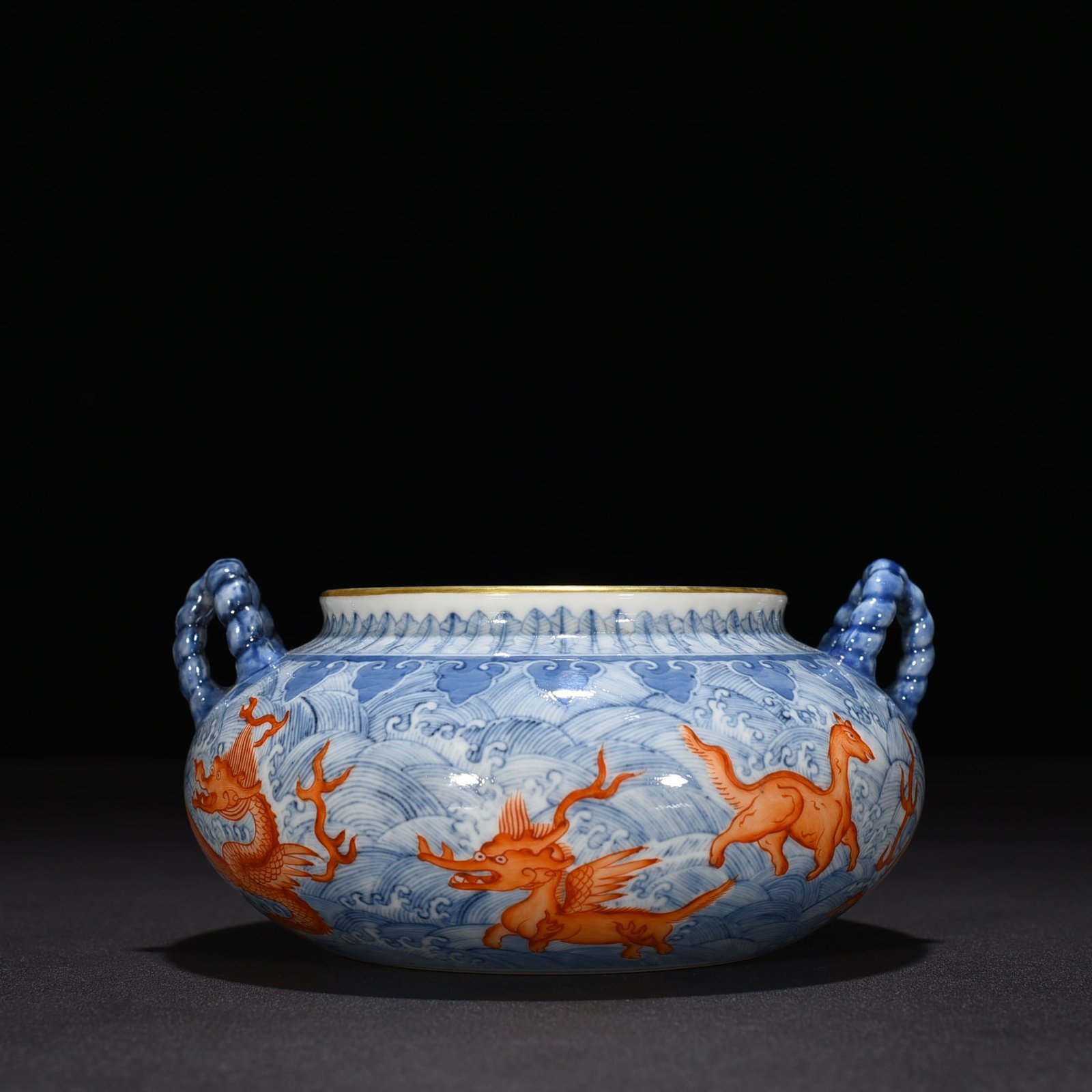 Qing Dynasty Yongzheng blue and white alum red sea eight monster pattern double ear wash