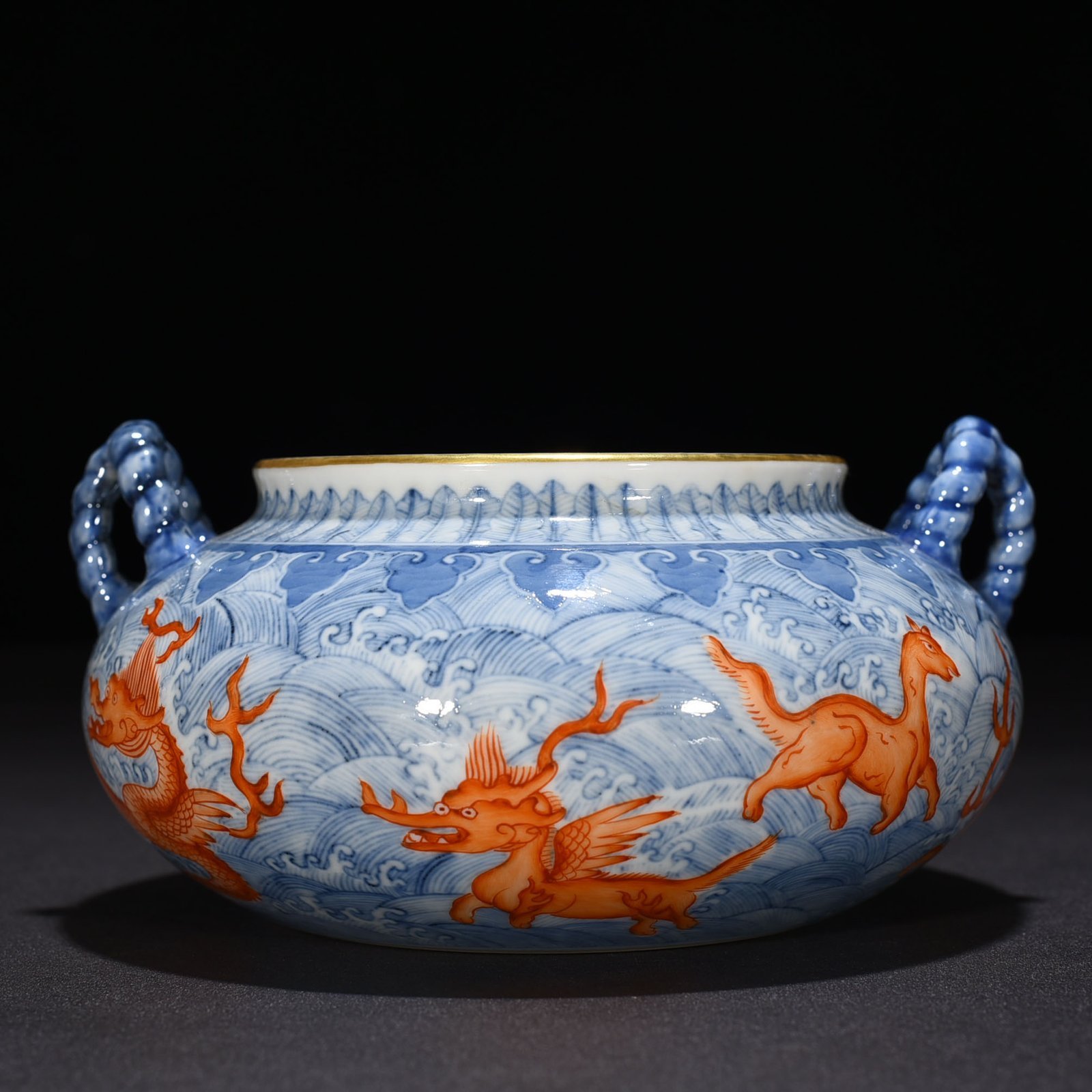 Qing Dynasty Yongzheng blue and white alum red sea eight monster pattern double ear wash