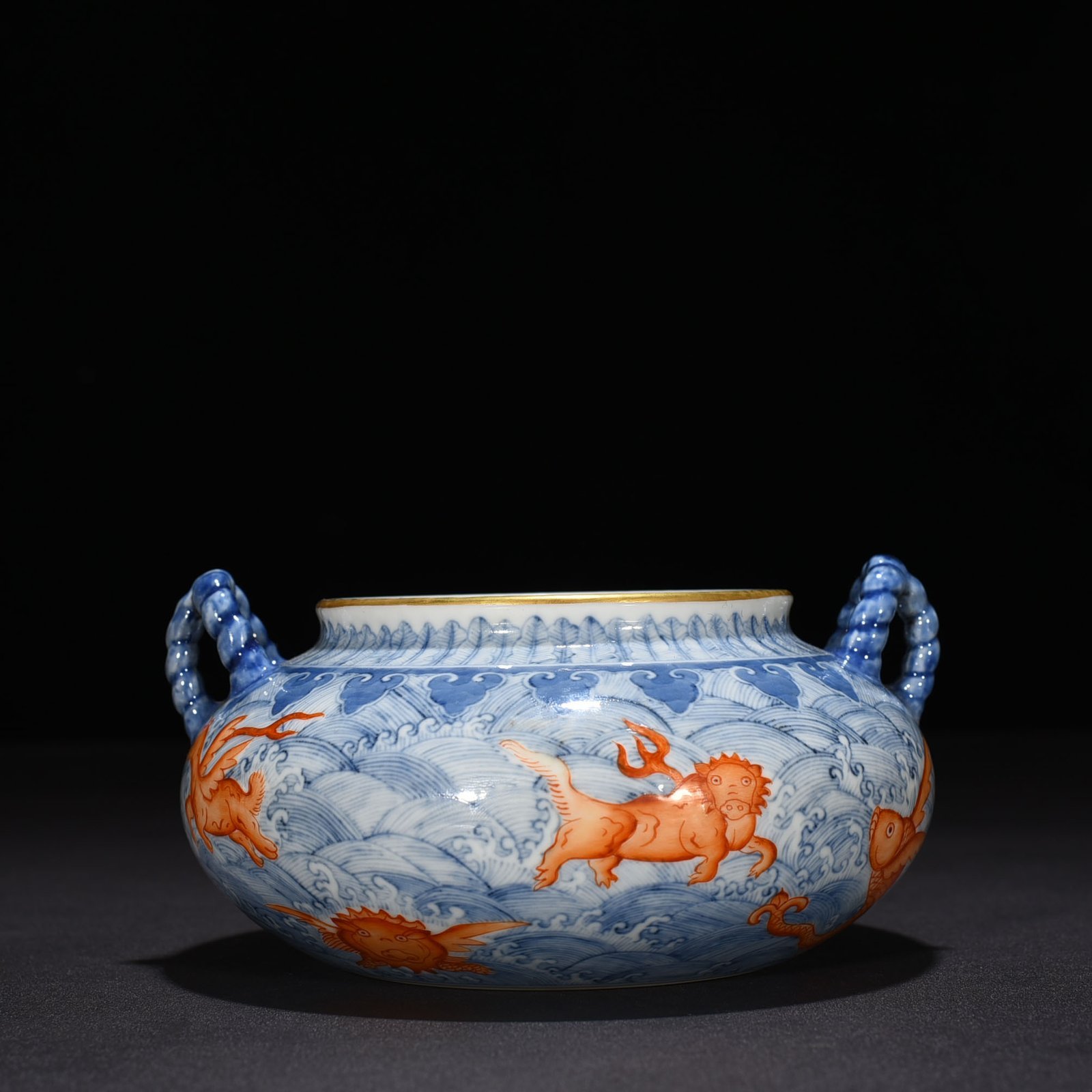 Qing Dynasty Yongzheng blue and white alum red sea eight monster pattern double ear wash