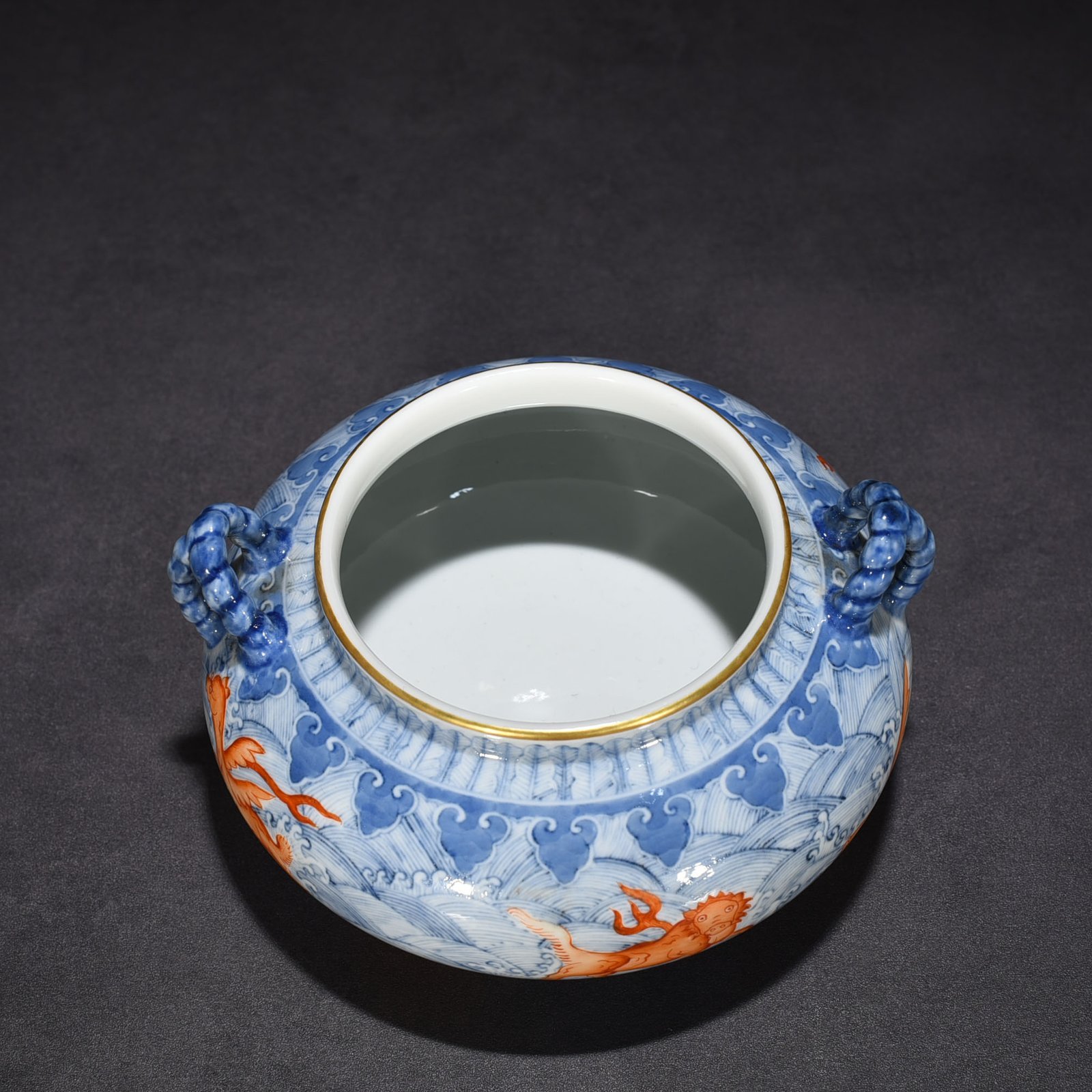 Qing Dynasty Yongzheng blue and white alum red sea eight monster pattern double ear wash