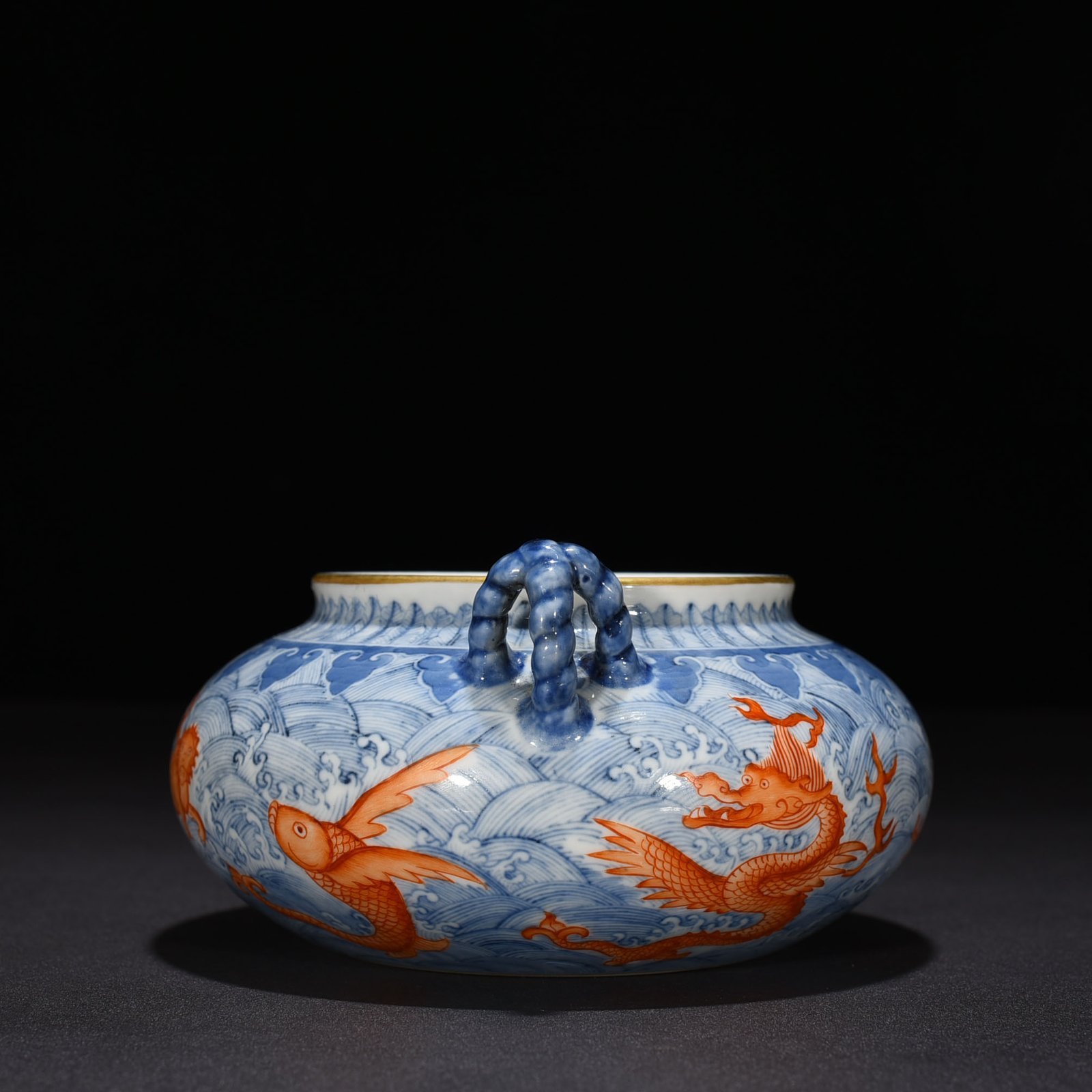 Qing Dynasty Yongzheng blue and white alum red sea eight monster pattern double ear wash