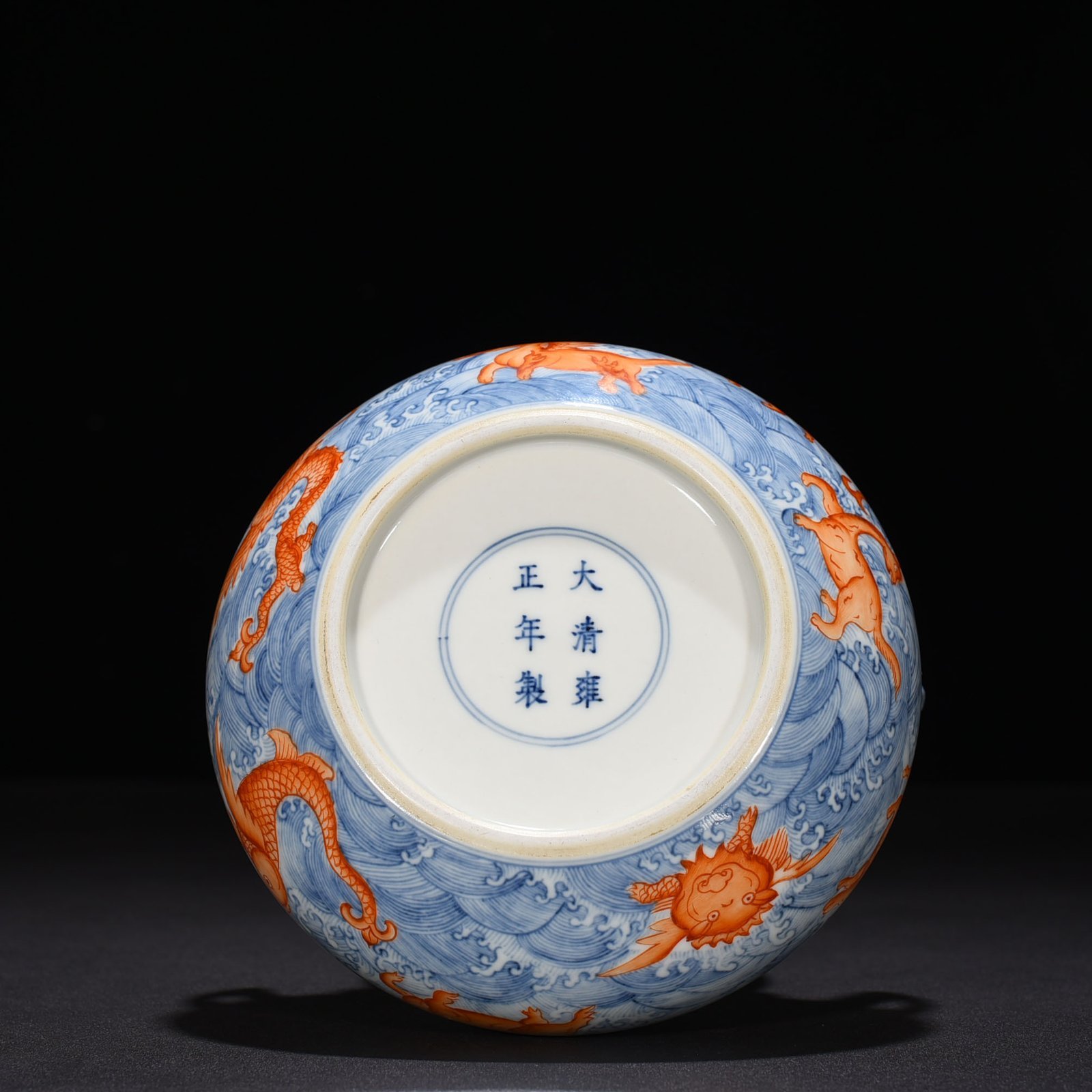 Qing Dynasty Yongzheng blue and white alum red sea eight monster pattern double ear wash