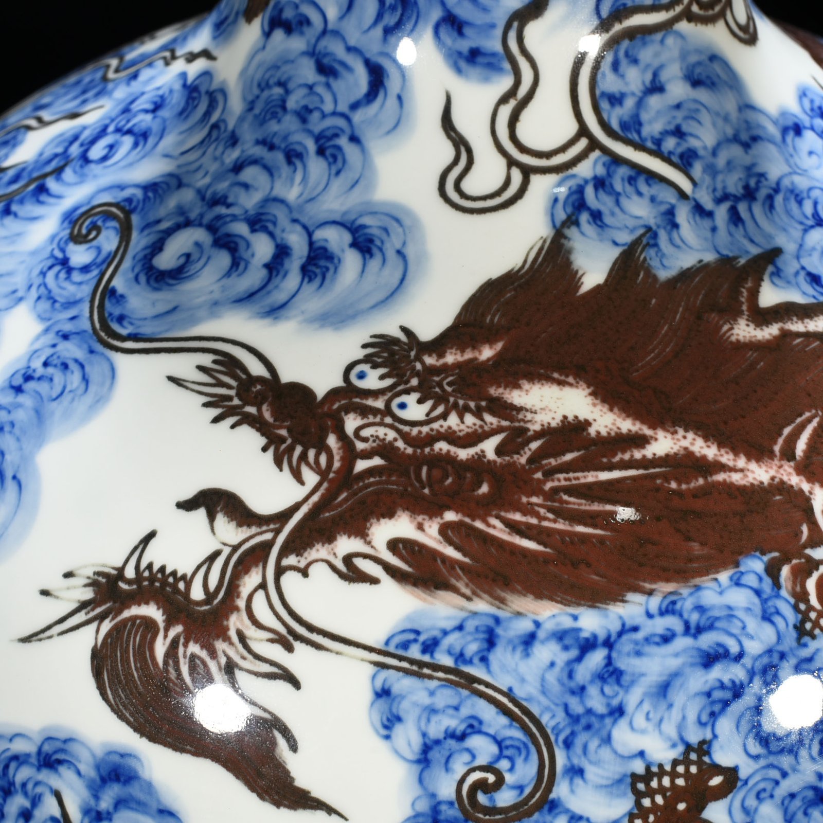 Qing Dynasty Yongzheng blue and white underglaze red sea water cloud and dragon celestial sphere vase