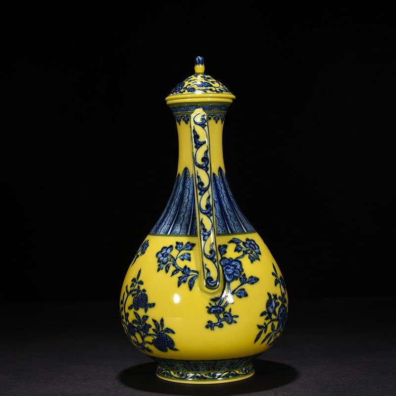 Qing Dynasty Yongzheng yellow ground blue and white ewer with broken branches