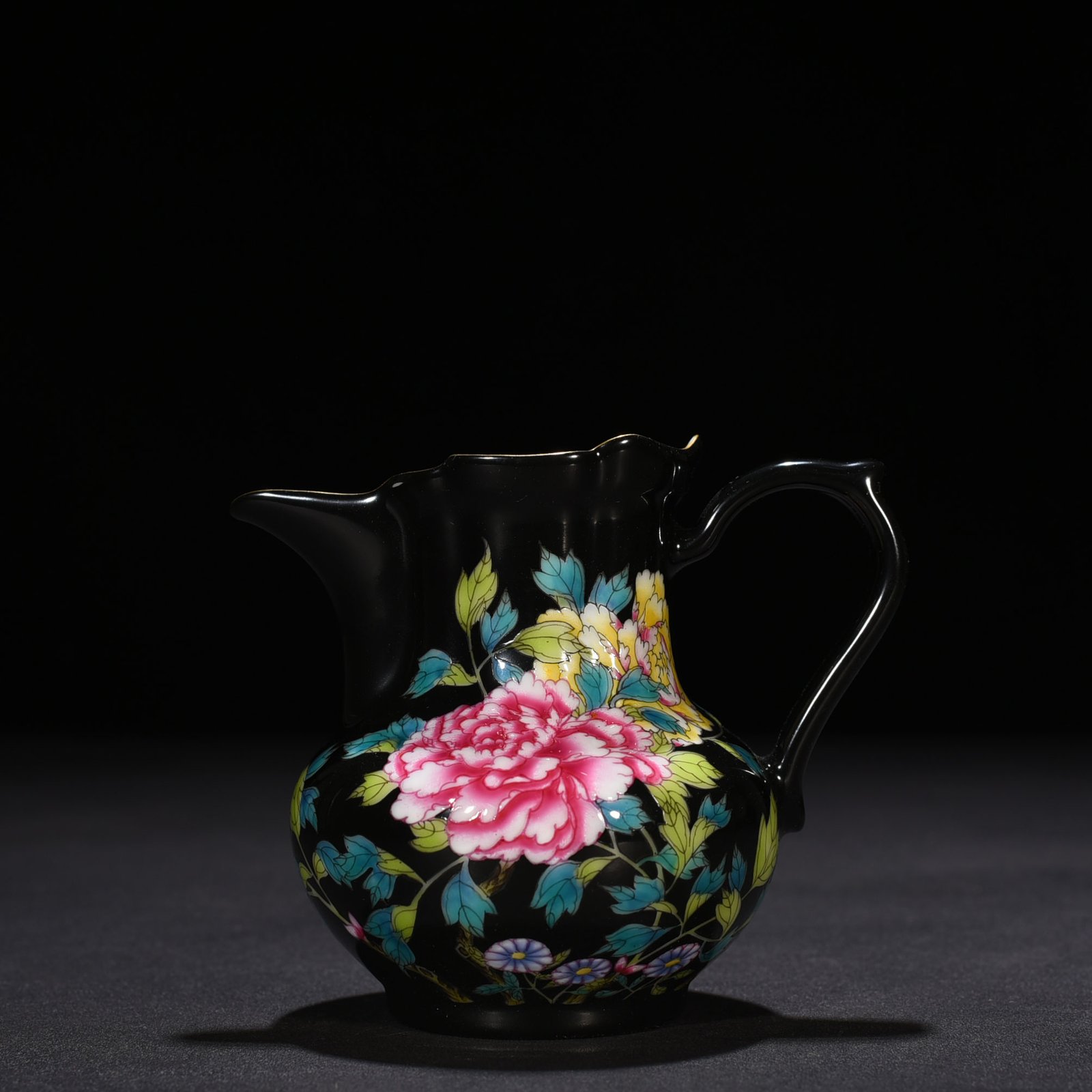 Qing Dynasty Yongzheng black ground enamel peony pattern monk’s hat tea dispenser