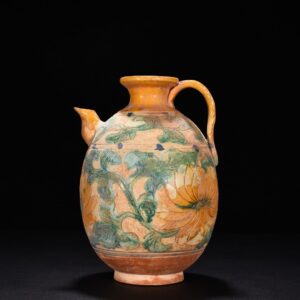 Liao Dynasty three-color engraved flower-patterned ewer