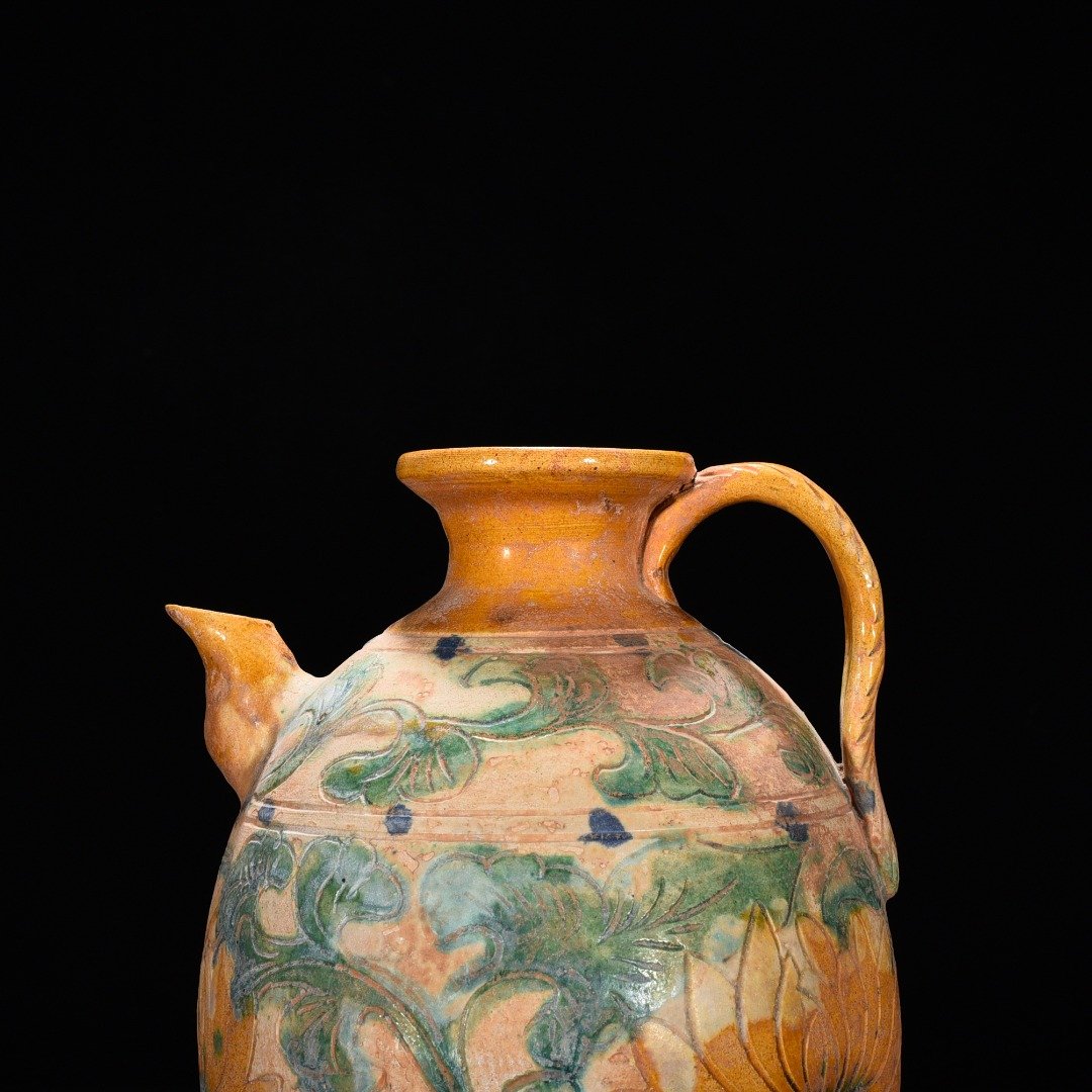 Liao Dynasty three-color engraved flower-patterned ewer