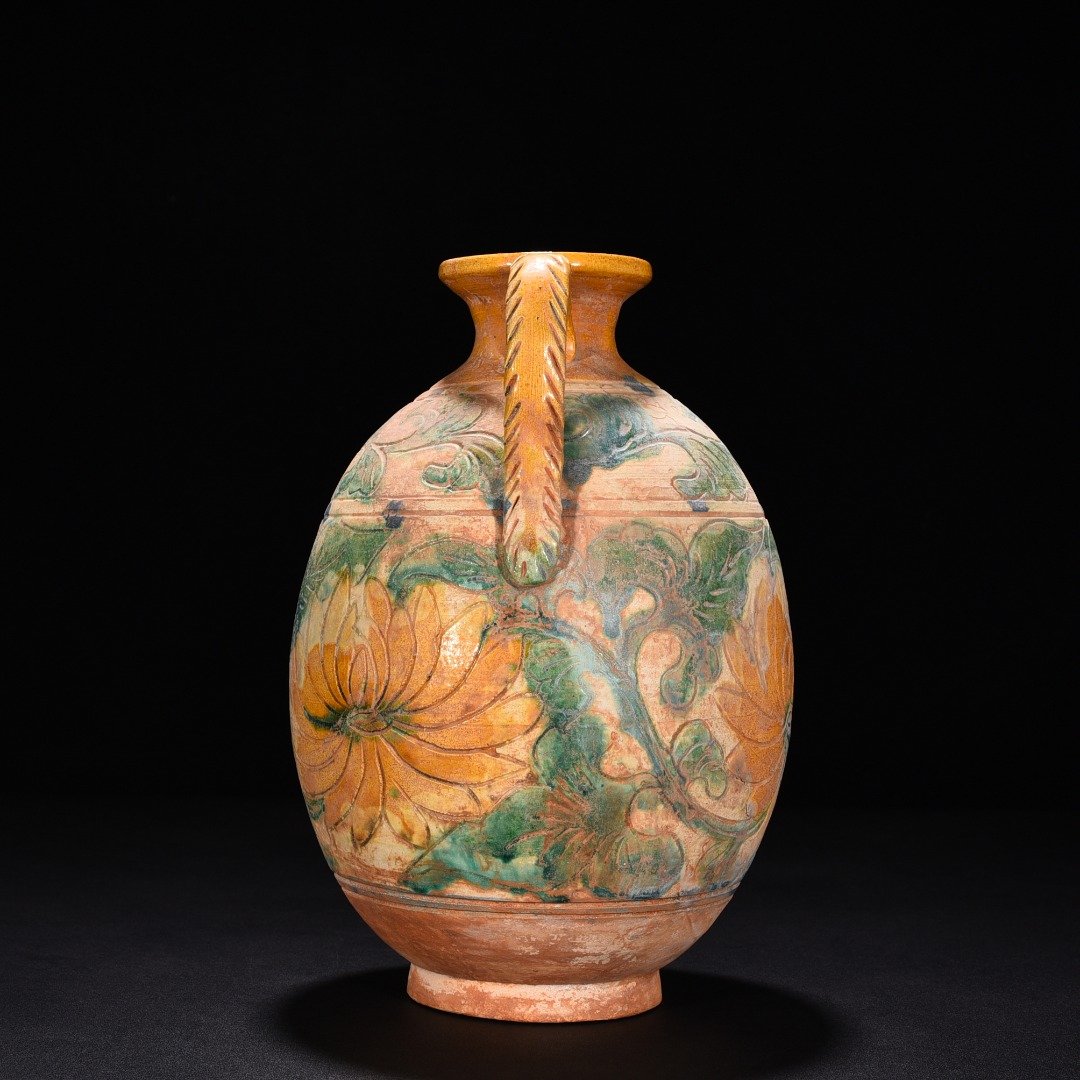 Liao Dynasty three-color engraved flower-patterned ewer