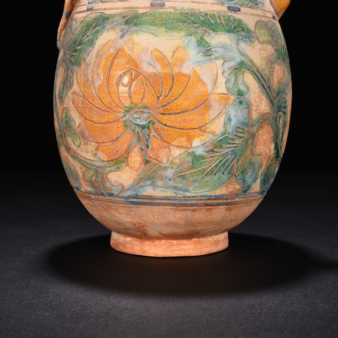 Liao Dynasty three-color engraved flower-patterned ewer