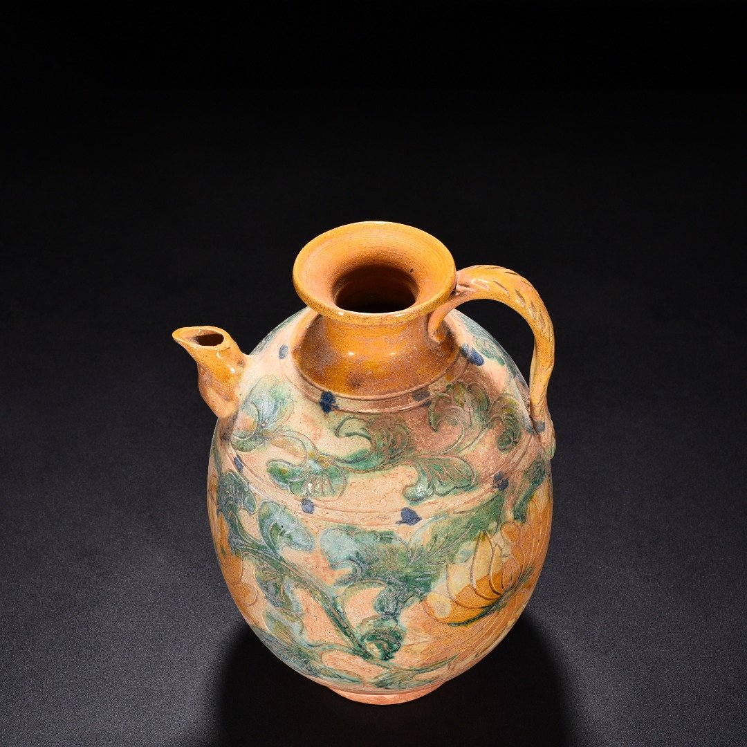 Liao Dynasty three-color engraved flower-patterned ewer