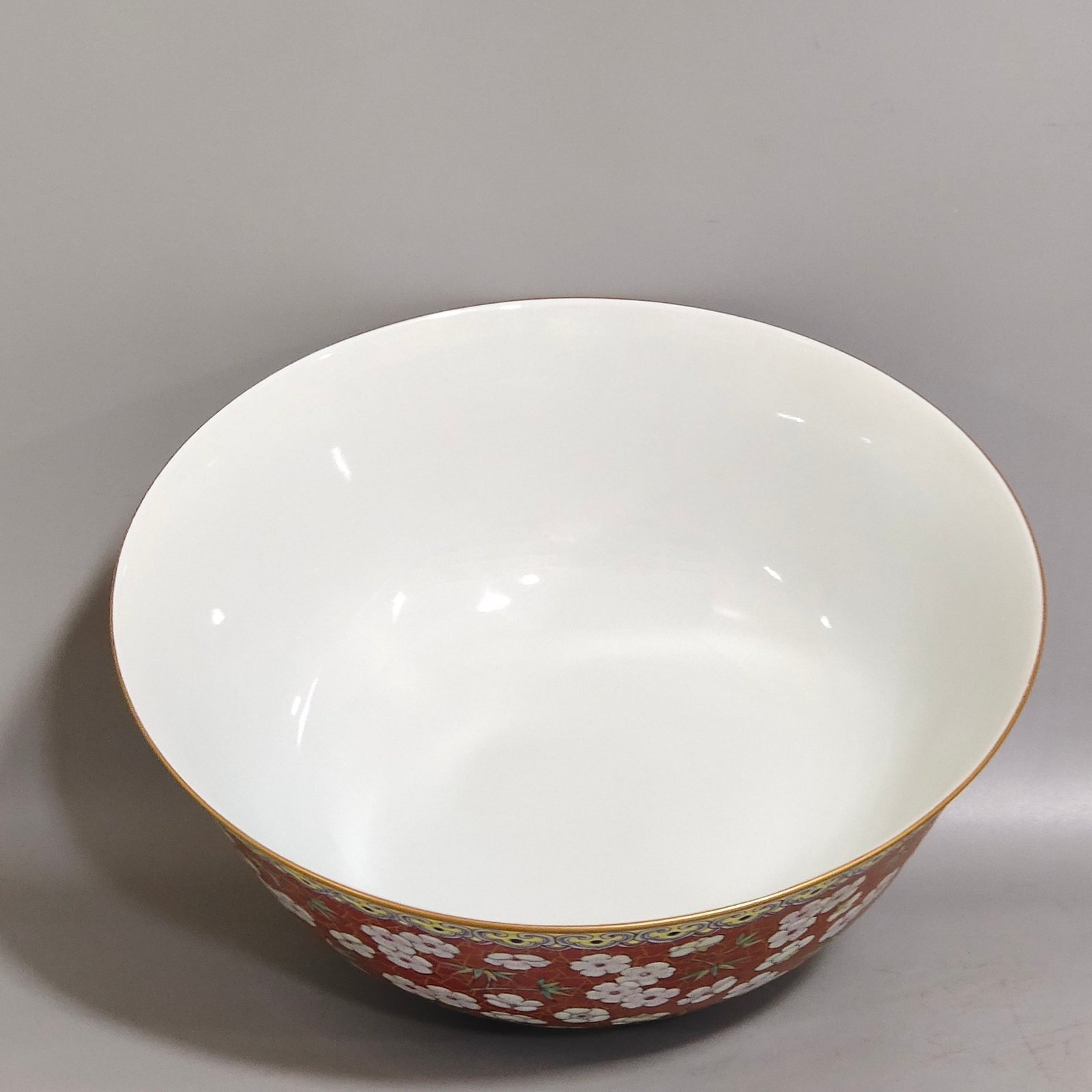 Qing Dynasty Qianlong A large coral red and gold ice plum bowl