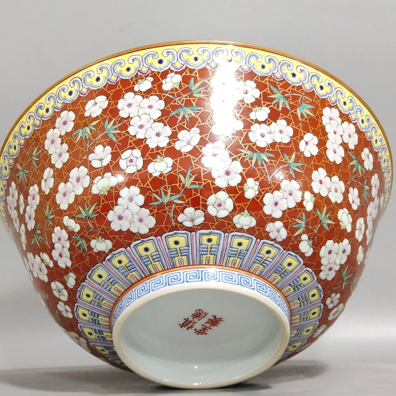 Qing Dynasty Qianlong A large coral red and gold ice plum bowl