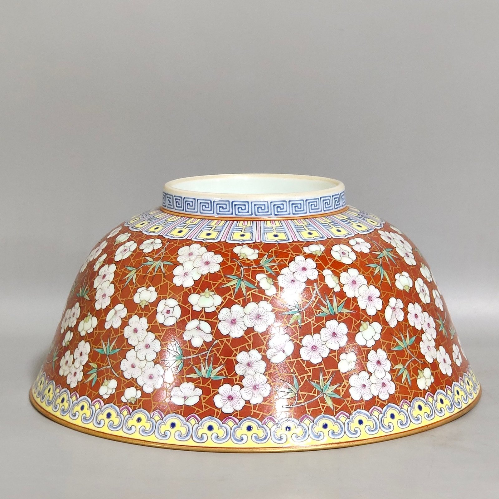 Qing Dynasty Qianlong A large coral red and gold ice plum bowl