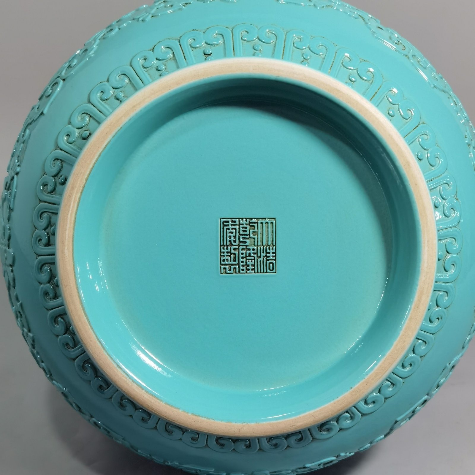 Qing Dynasty Qianlong turquoise green glaze hollow lotus and longevity pattern elephant ear vase