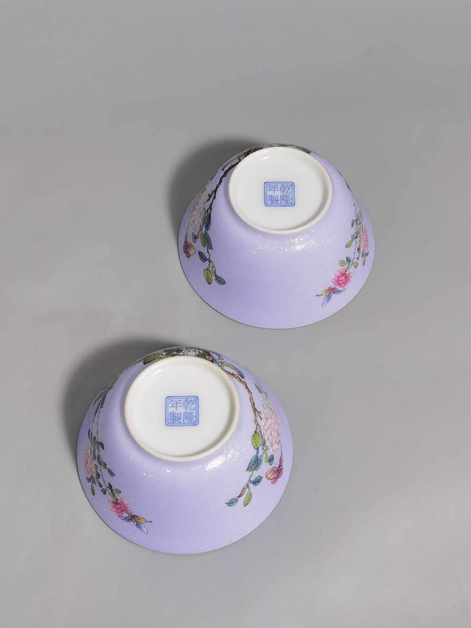 Qing Dynasty Qianlong a pair of enamel purple ground cups