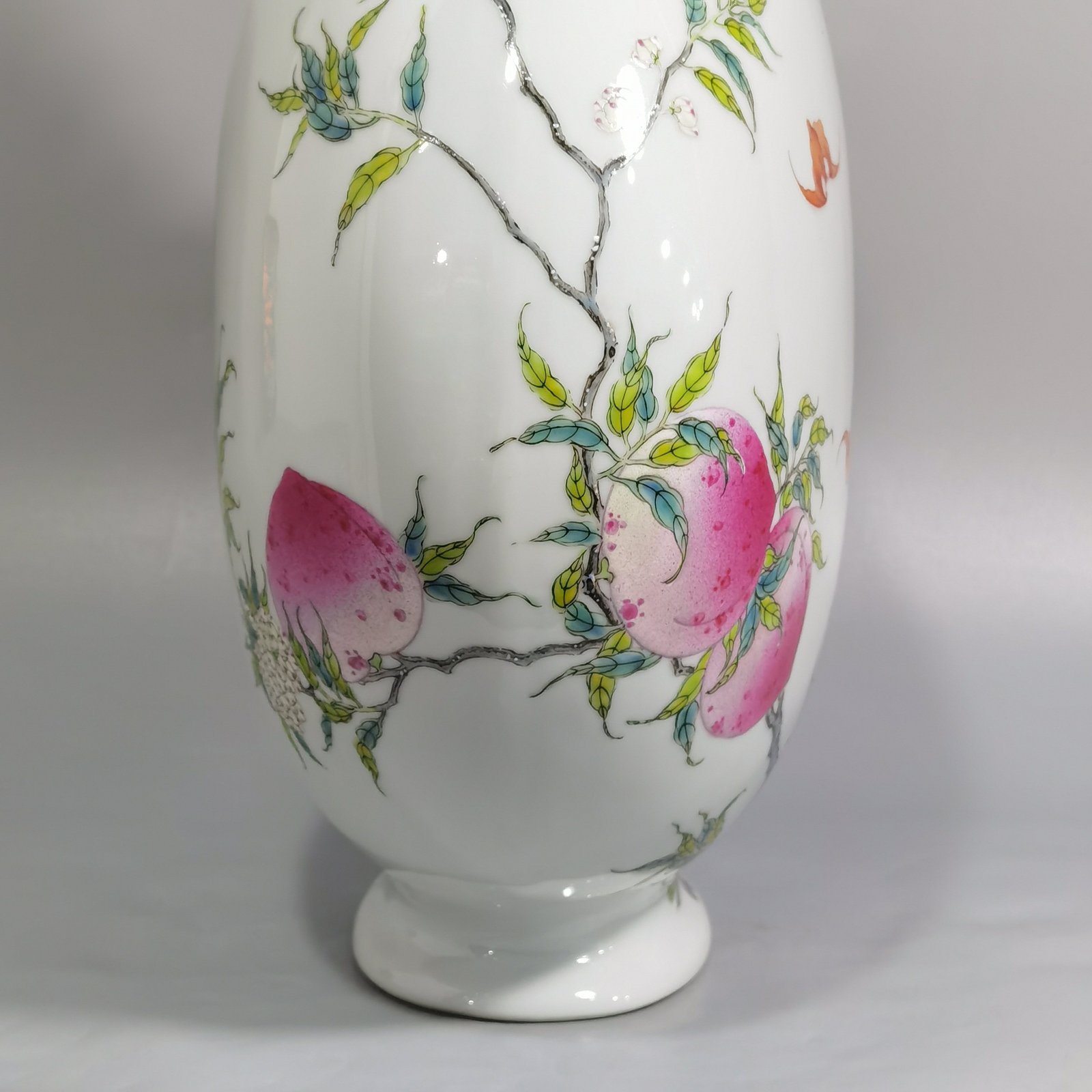 Qing Dynasty Qianlong pastel nine peach and five blessings double-eared moon-holding flat vase