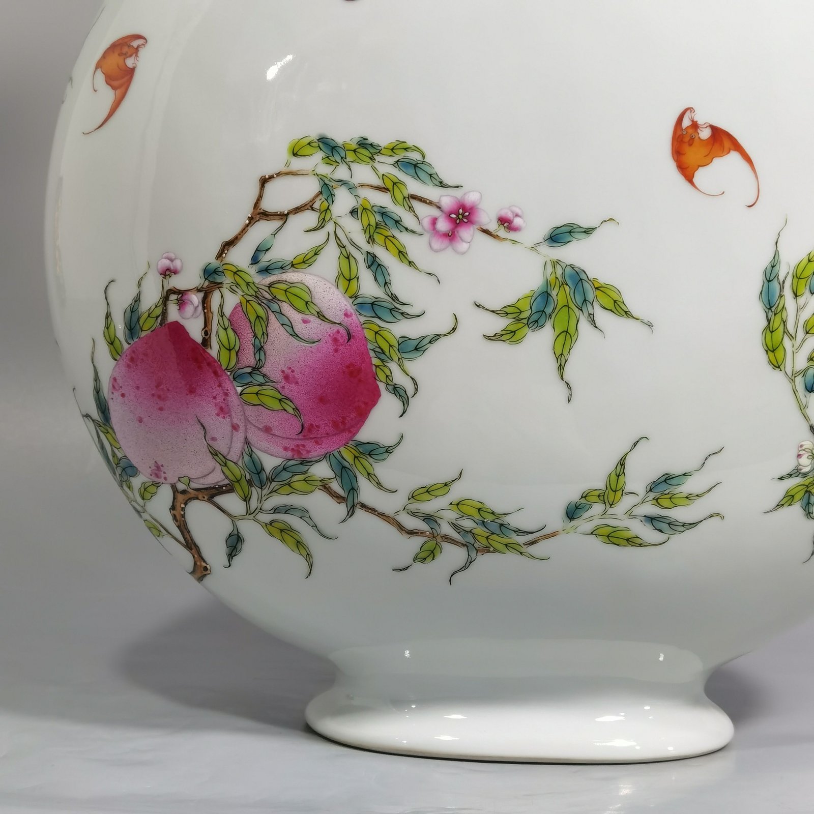 Qing Dynasty Qianlong pastel nine peach and five blessings double-eared moon-holding flat vase