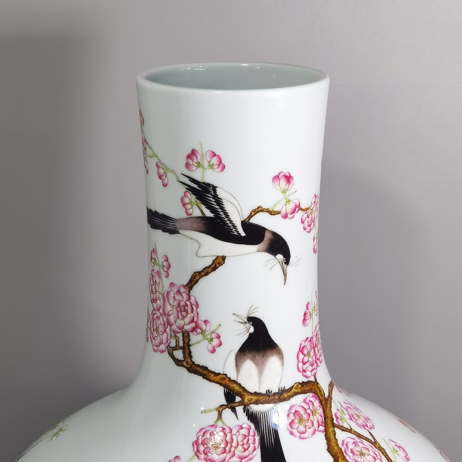 Qing Dynasty Qianlong famille rose twelve magpies ascending plum blossom celestial sphere vase