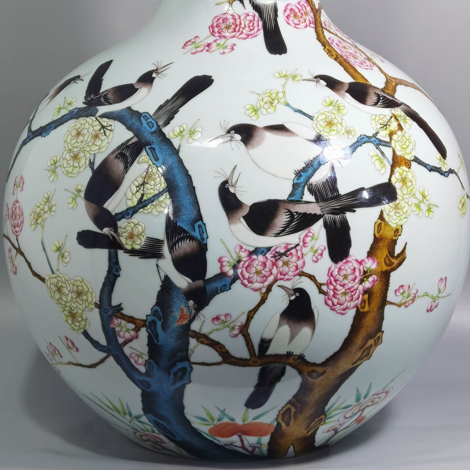 Qing Dynasty Qianlong famille rose twelve magpies ascending plum blossom celestial sphere vase