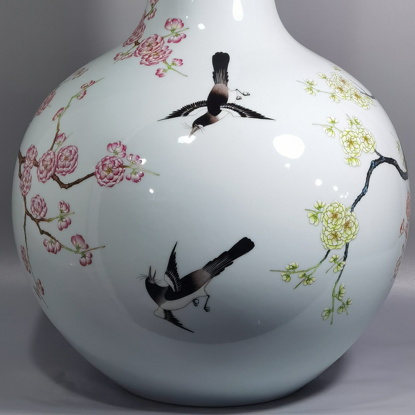 Qing Dynasty Qianlong famille rose twelve magpies ascending plum blossom celestial sphere vase