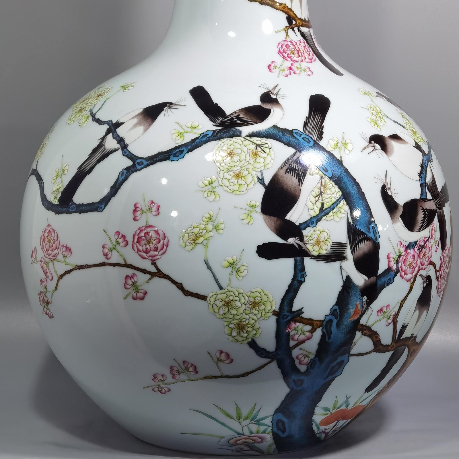 Qing Dynasty Qianlong famille rose twelve magpies ascending plum blossom celestial sphere vase