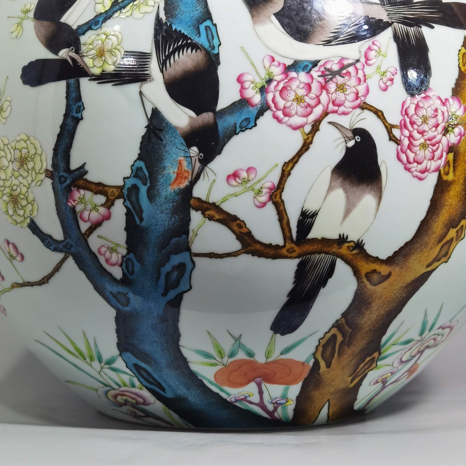 Qing Dynasty Qianlong famille rose twelve magpies ascending plum blossom celestial sphere vase