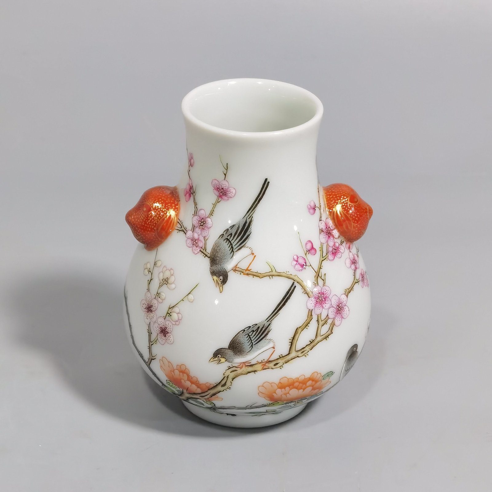 Qing Dynasty Qianlong a pastel four-sided plum blossom statue with animal ear