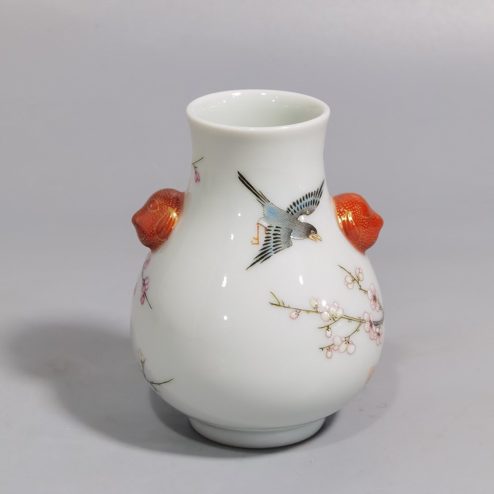 Qing Dynasty Qianlong a pastel four-sided plum blossom statue with animal ear