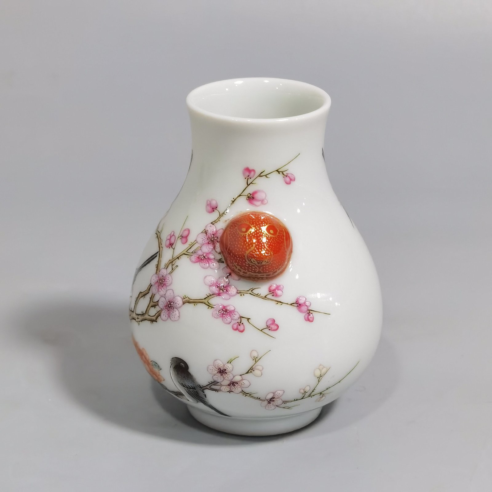 Qing Dynasty Qianlong a pastel four-sided plum blossom statue with animal ear