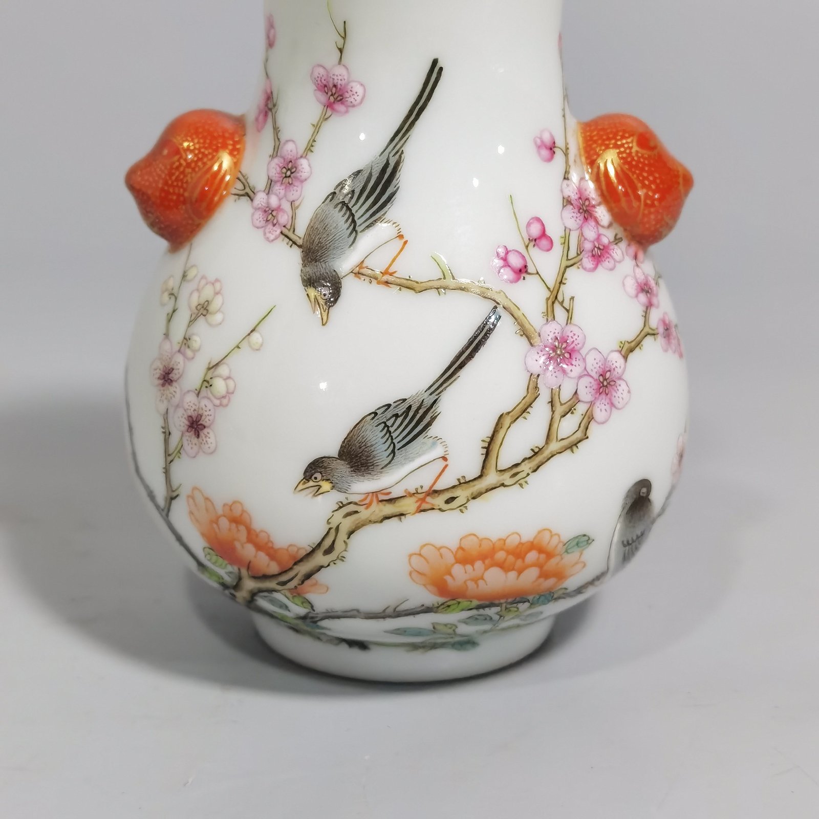 Qing Dynasty Qianlong a pastel four-sided plum blossom statue with animal ear