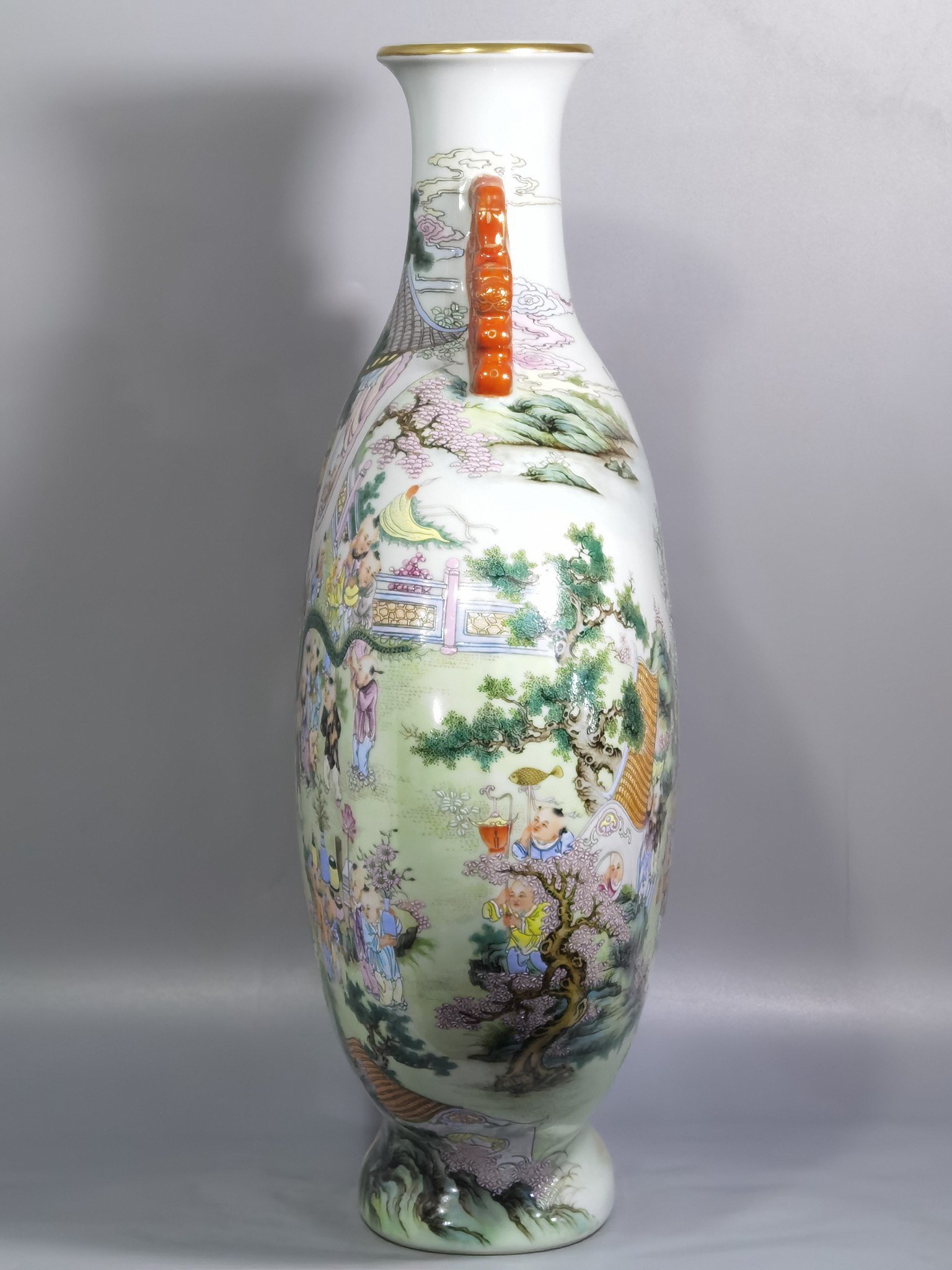 Qing Dynasty Qianlong a pastel-colored baby playing with two ears holding the moon in a flat vase