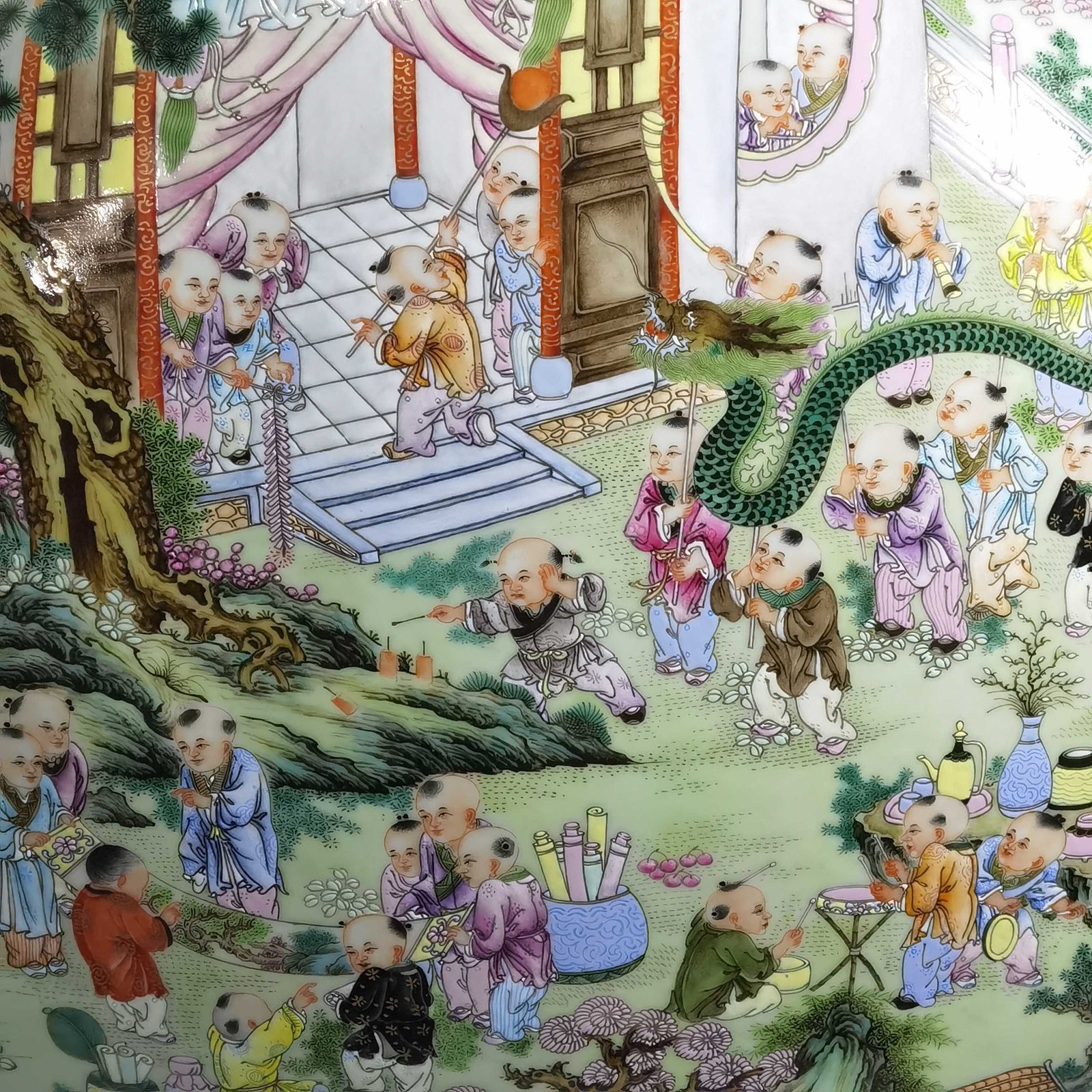 Qing Dynasty Qianlong a pastel-colored baby playing with two ears holding the moon in a flat vase